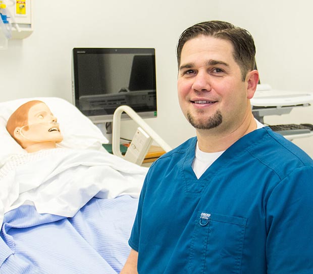 EKG student in simulation lab.