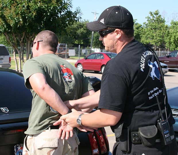 Man being arrested.