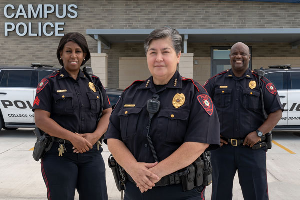 Campus Police building with officers in front